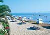 The beach front of Roda, Corfu